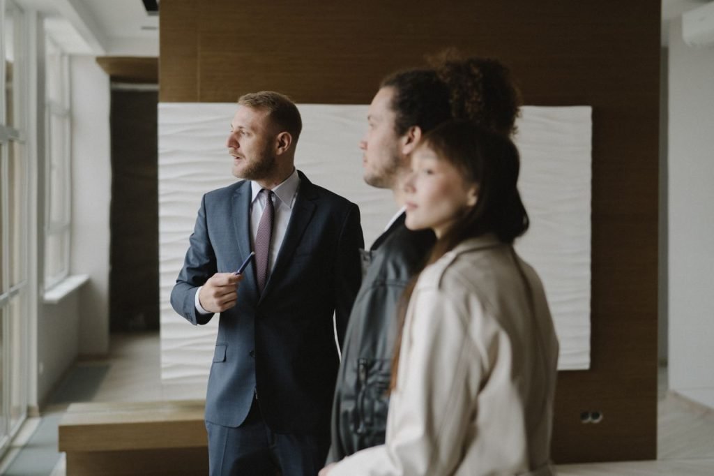 Professional team discussing strategy in a stylish modern office environment.